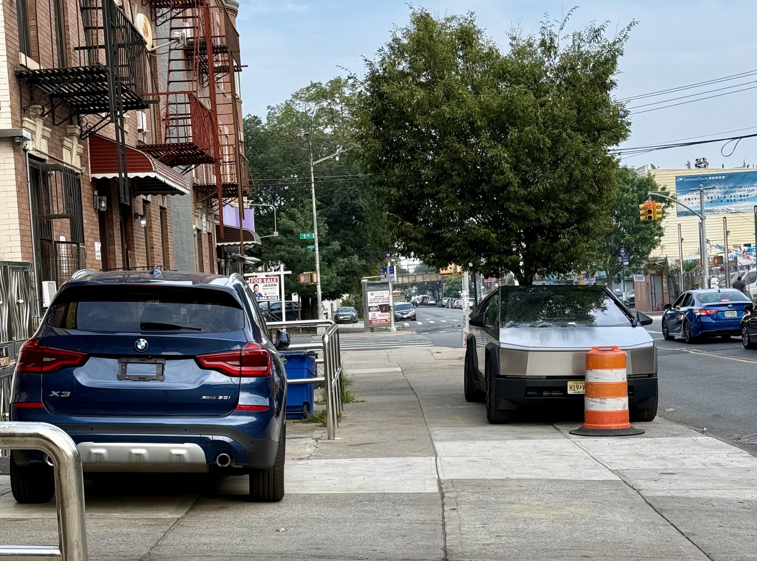 Cars parked on a sidewalk