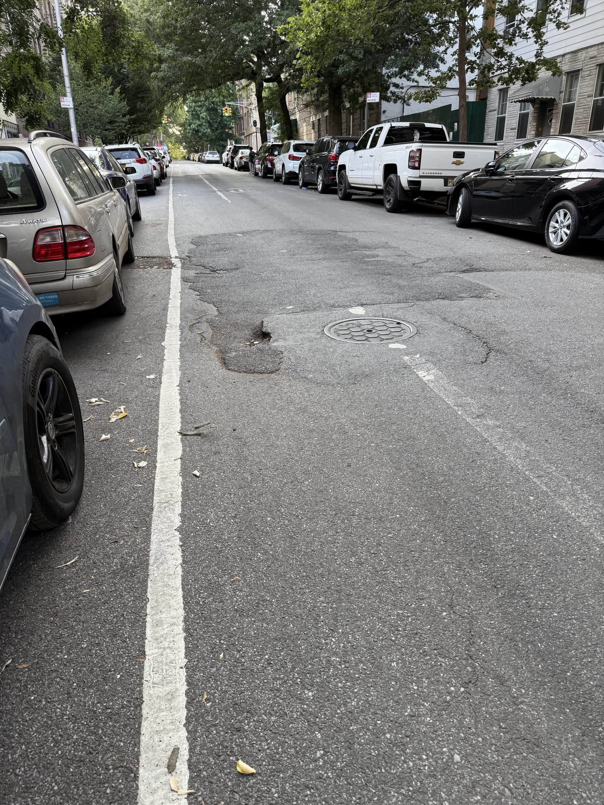 sinkhole in a bike lane