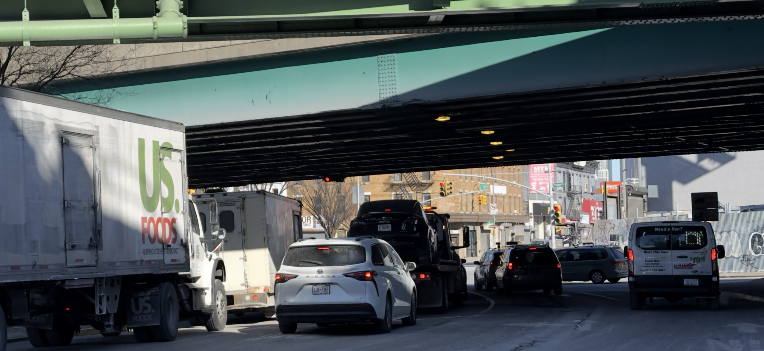 Car and truck traffic on 3rd avenue in Sunset Park Brooklyn